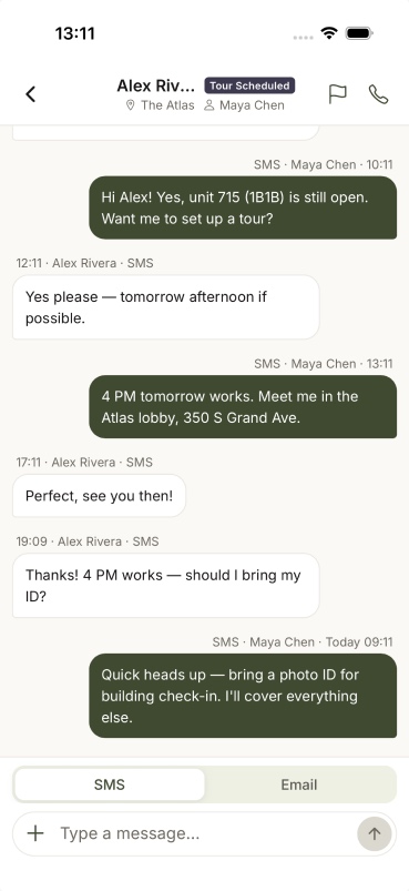 An SMS thread with a prospect — scheduling a tour, confirming a time, and a check-in reminder